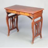 A 19th Century campaign style folding writing table fitted 2 drawers, raised on pierced panelled