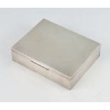 A rectangular silver engine turned cigarette box Birmingham 1969, 11cm