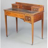 An Edwardian inlaid mahogany and crossbanded writing table with raised back fitted 2 drawers with