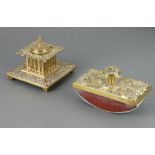 A Victorian embossed brass desk blotter 7cm x 12cm x 6.5cm, a square brass inkwell with hinged lid