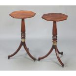 A pair of Regency style octagonal wine tables, raised on turned and reeded pillar and tripod