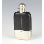 A glass, leather and silver mounted hip flask with silver cover and cup base, Sheffield 1925, 16cm