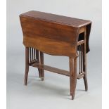 A shaped mahogany Sutherland table 63cm h x 62cm x 17cm Sticks to the side are damaged