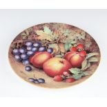 A Royal Worcester dessert plate decorated with flowers 20cm