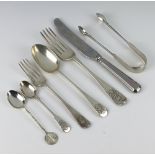 A Victorian silver dinner fork London 1860 and 5 other pieces of silver cutlery, 288 grams