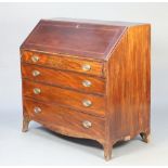 A Georgian inlaid mahogany bureau, the fall front revealing a well fitted interior above 4 drawers