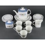 A Royal Doulton Pastoral part tea set comprising teapot (a/f), 5 tea cups, 5 saucers, 6 small