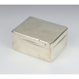 A rectangular silver cigarette box, London 1907, 11.5cmThis box is dented