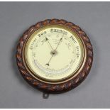 An aneroid barometer the painted dial marked Reynolds and Sons 32 Crutched Friars London,
