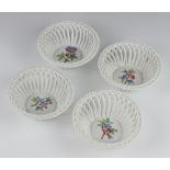 A set of 4 Herend basket weave dishes decorated with flowers 13cm