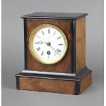 A 19th Century timepiece with 8cm enamelled dial, Roman numerals, contained in a walnut and ebonised