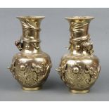 A pair of Japanese polished bronze club shaped vases with dragon decoration, base with seal mark