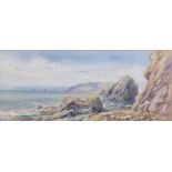 Watercolour, rocky beach scene with fishing boats, indistinctly signed and dated to bottom left hand