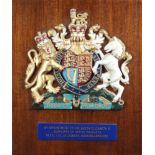 An Elizabeth II plastic royal warrant holders plaque for Rexel Ltd of Aylesbury Bucks 60cm x 52cm