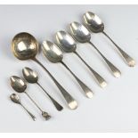 A George III style silver ladle, 7 spoons, 176 grams