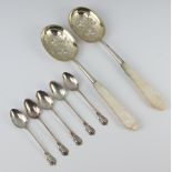 A pair of Victorian silver servers with mother of pearl handles Sheffield 1899 and 5 spoons, 56