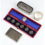 A set of 6 Edwardian pierced silver buttons Chester 1901, together with a napkin ring, box lid and