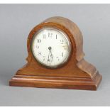 A French bedroom timepiece with 8cm enamelled dial, Arabic numerals, contained in inlaid mahogany
