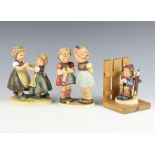 A Hummel group of 2 standing children dancing 353/1 16cm, ditto 2 girls standing 256 18cm and a