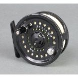 A System 2 DT-8-F fishing reel with cloth case