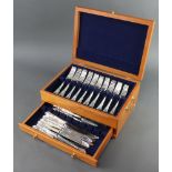 A modern canteen of silver plated lily pattern cutlery for 12 comprising 12 dessert forks, 12 dinner