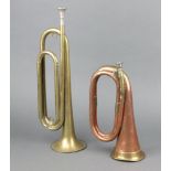 The Rex Ratt Official brass bugle Boy Scouts of America together with a copper and brass bugle