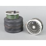 A Hardy Marquis no.2, 4" salmon fishing reel complete with pouch together with a Hardy wetfly 2 DT