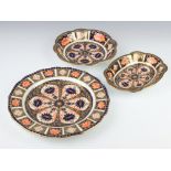 A Royal Crown Derby Imari pattern plate 1126 22.5cm, a ditto oval dish 17cm 1128 and a circular dish
