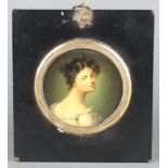 An 18th/19th Century circular portrait miniature on copper, study of a lady, 8cm, contained in an