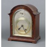 A 1930's striking bracket clock with 14cm arched silvered dial, Roman numerals, strike/silent