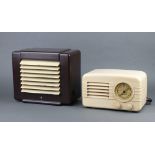 A Champion Bakelite radio no.784 contained in a Bakelite case 16cm x 26cm x 14cm (crack to slide,