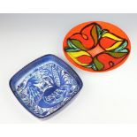 A stylish mid Century Danish square dish decorated with an exotic bird 23cm, together with a Poole