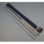 A Hardy 15' 4", 3 piece graphite salmon fly deluxe fishing rod in blue cloth bag The rubber butt has