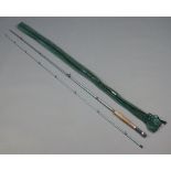 An Alan Pearson "The Baron" 10' 6" two piece fly fishing rod in green cloth bag