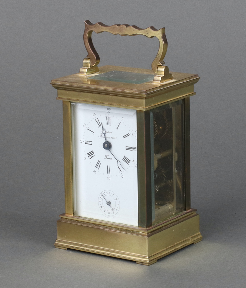 A 20th Century 8 day carriage alarm clock, the enamelled dial with Roman numerals marked Rappost
