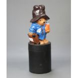 Paddington Bear, a large plastic charity collecting box in the form of a standing Paddington Bear