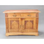 A 19th Century Art Nouveau Continental walnut cabinet fitted a brushing slide above 2 long