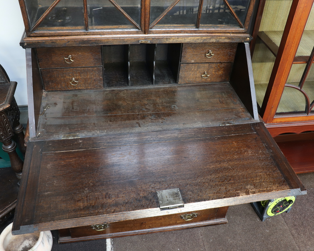 A 19th Century oak bureau bookcase the later associated top fitted shelves enclosed by astragal - Image 2 of 6