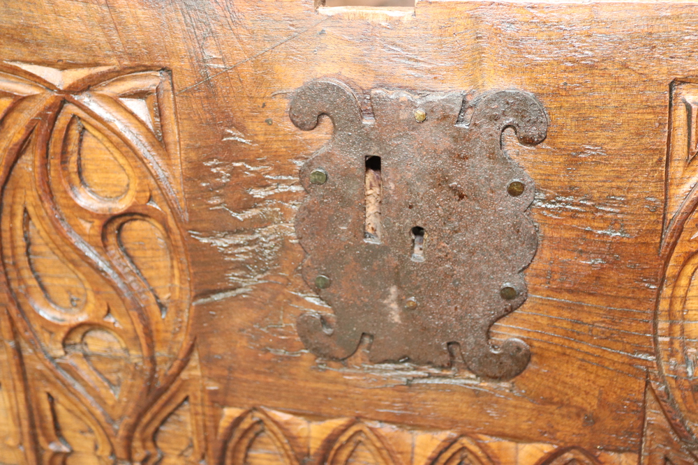 A 16th and later Century Spanish Gothic carved fruitwood coffer with iron hinged lid and shaped iron - Image 10 of 13