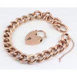 A 9ct yellow gold hollow link bracelet and padlock, 20cm 16 grams