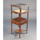A 19th/20th Century square mahogany bijouterie table with hinged lid, the base with undertier