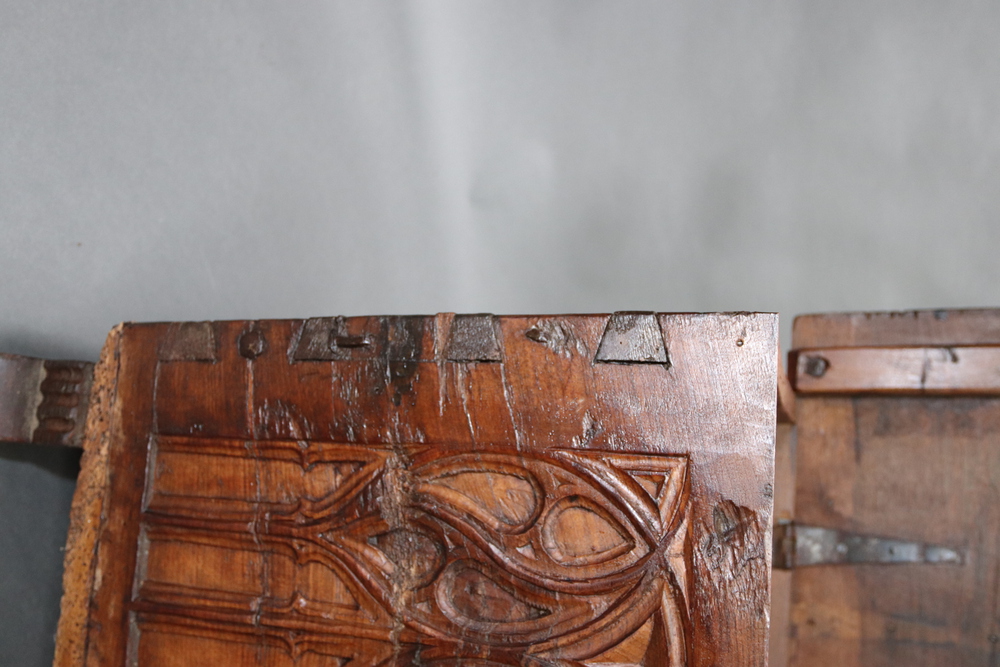 A 16th and later Century Spanish Gothic carved fruitwood coffer with iron hinged lid and shaped iron - Image 6 of 13