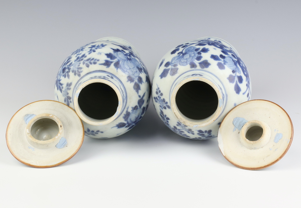 A pair of 19th Century Chinese blue and white oviform vases and covers decorated with a band of a - Image 4 of 6