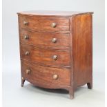 A Georgian mahogany bow front chest of 4 long drawers, raised on splayed bracket feet 102cm h x 90cm