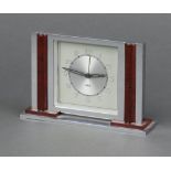 Jaz, an Art Deco alarm clock, the 8cm silvered dial with Roman numerals marked Jaz, contained in a