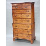 A Georgian mahogany secretaire chest on chest with moulded and dentil cornice, the upper section