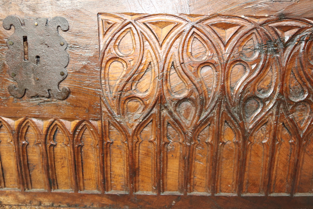 A 16th and later Century Spanish Gothic carved fruitwood coffer with iron hinged lid and shaped iron - Image 7 of 13