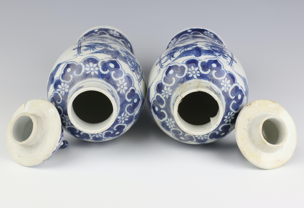 A pair of Chinese 19th Century blue and white oviform vases decorated with figures on a balcony with - Image 5 of 6