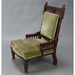 A late Victorian carved mahogany show frame chair with bobbin turned decoration, seat and back
