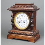 A Victorian 8 day mantel clock with 12cm blue enamelled dial, Roman numerals, striking on bell,